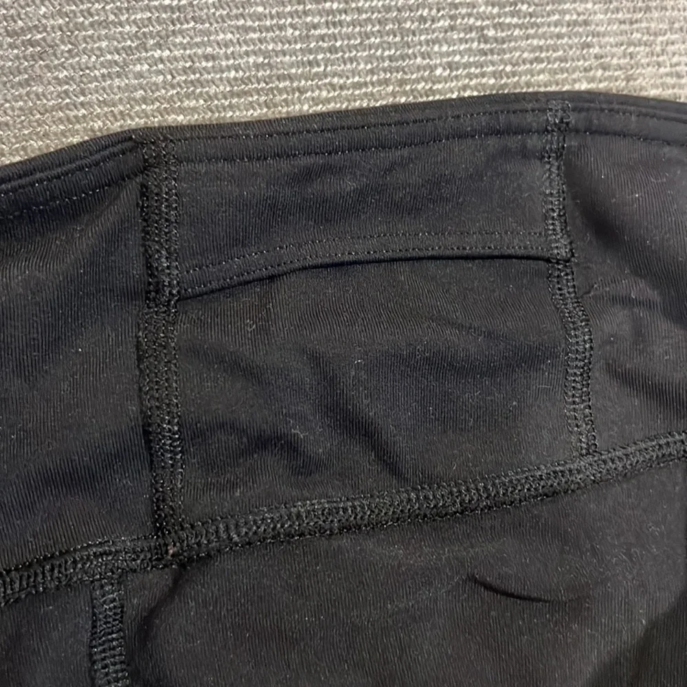 Athleta Black Cropped Workout Pants with Criss Cross Detail Size Large Tall - Picture 8 of 8